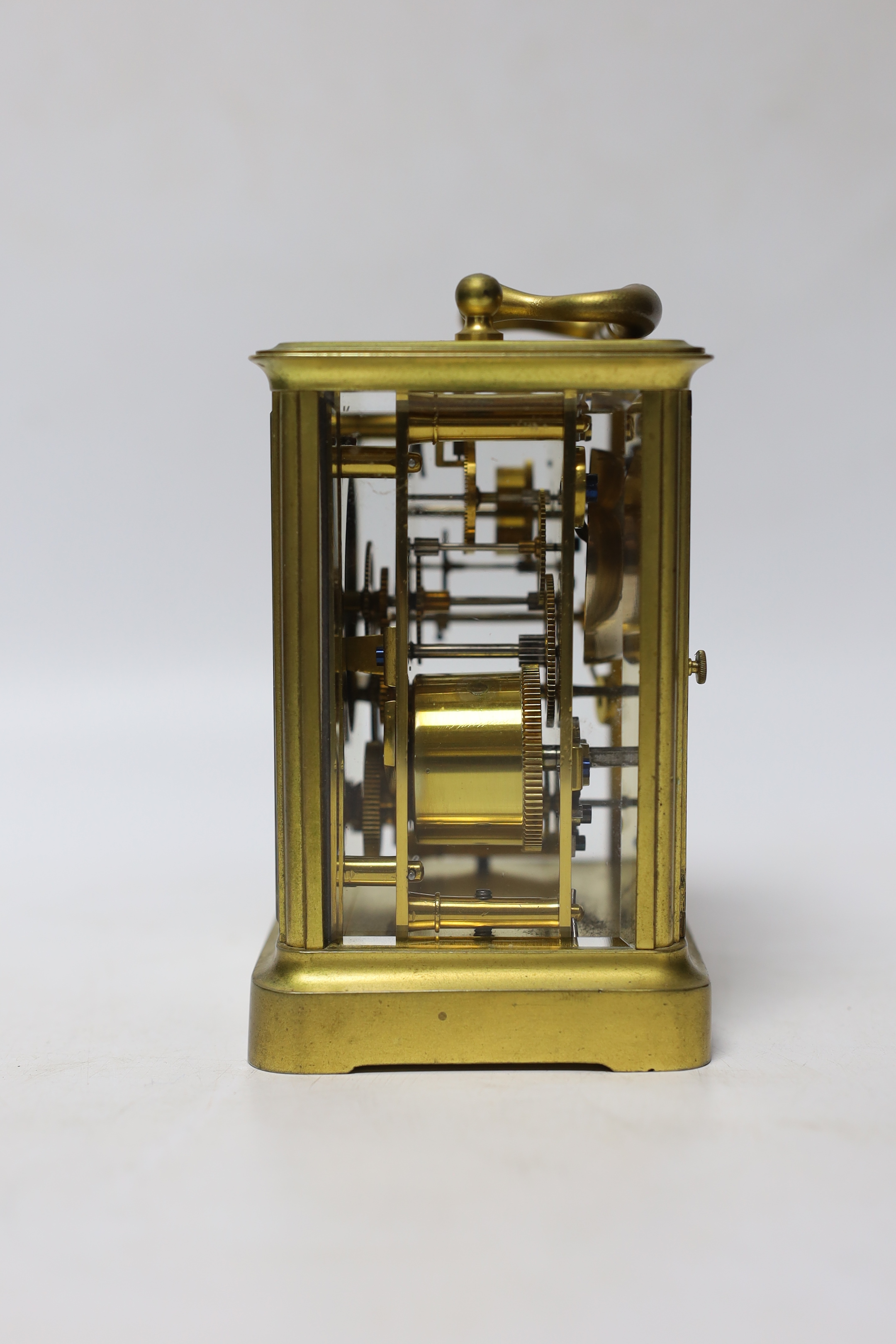 A French brass carriage clock striking on a bell, 12cm